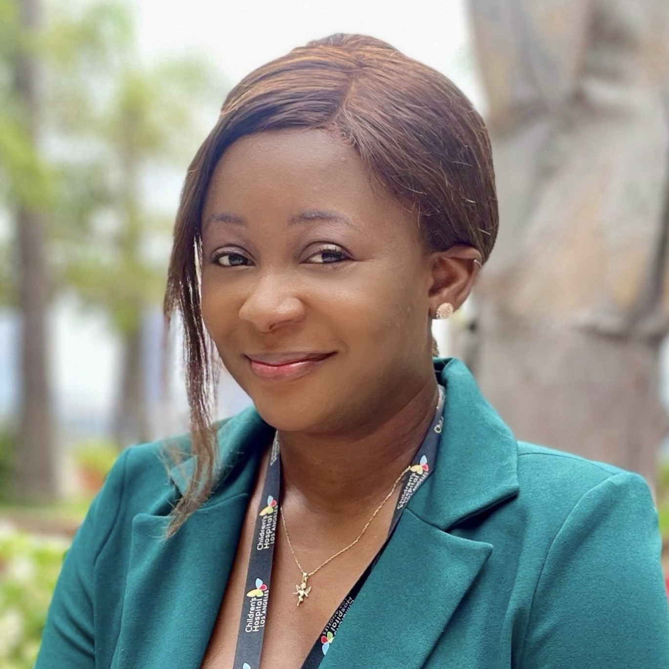 Headshot of Regine Minya