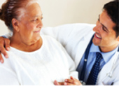 Doctor helping patient