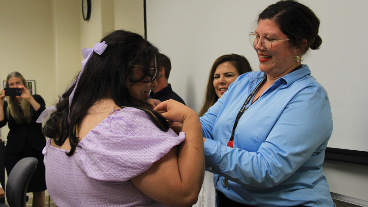 Public Health student receiving medal